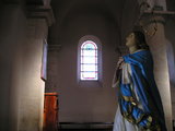 Statue of Our Lady and window in the Church