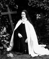 St. Therese near a Cross
