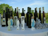 Selling wine, rakijas and statues of Our Lady