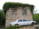 House and White Mercedes in Medjugorje