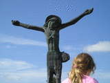 Statue of The Risen Saviour and a pilgrim child